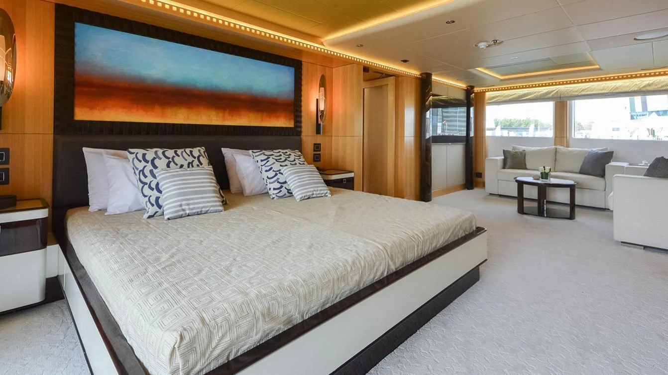 a large bed in a room aboard MY ESCAPE Yacht for Sale
