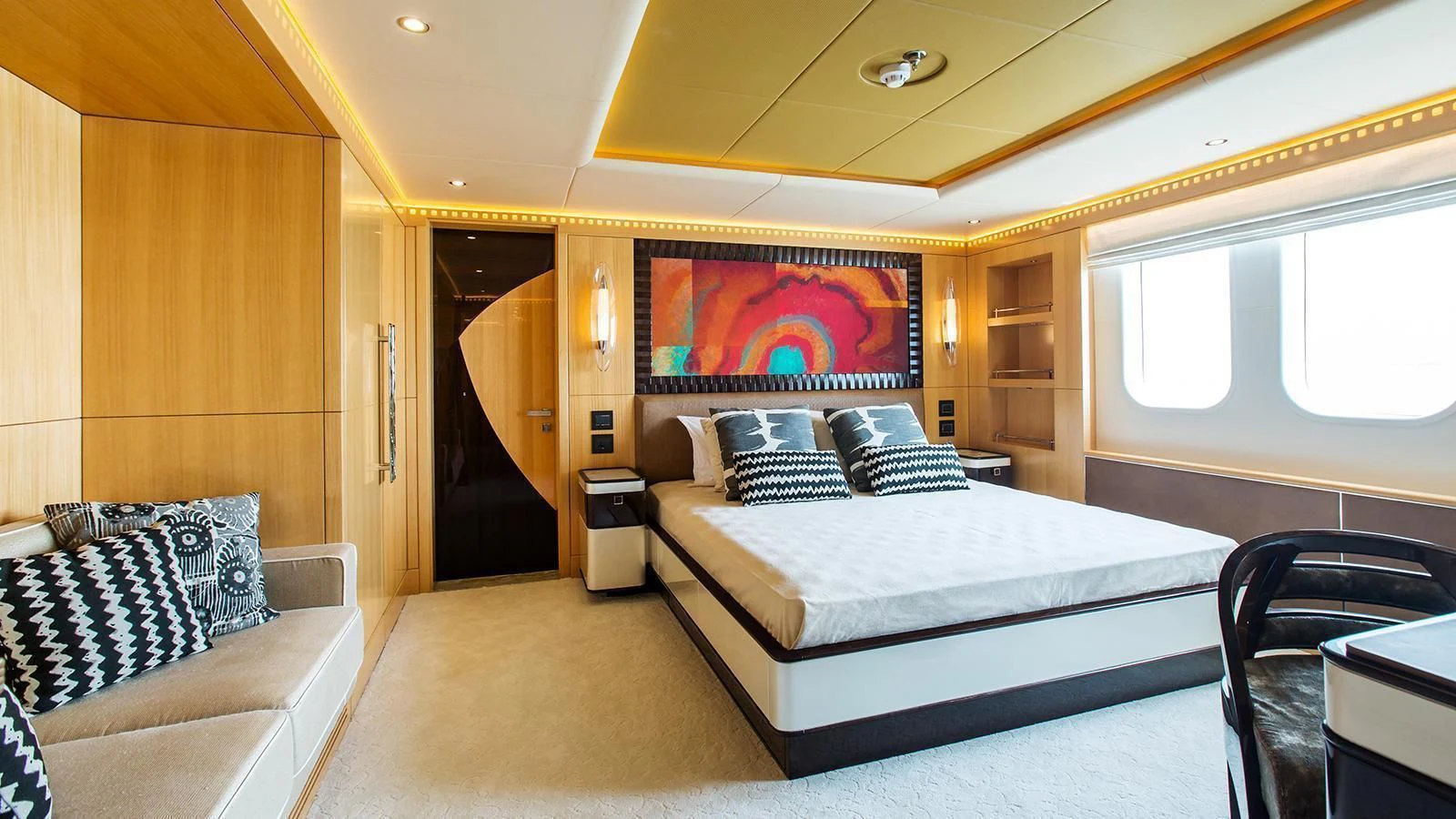 a room with a bed and a couch aboard MY ESCAPE Yacht for Sale