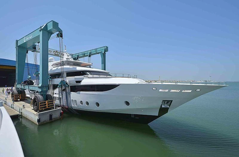 a large white boat on a body of water aboard MY ESCAPE Yacht for Sale