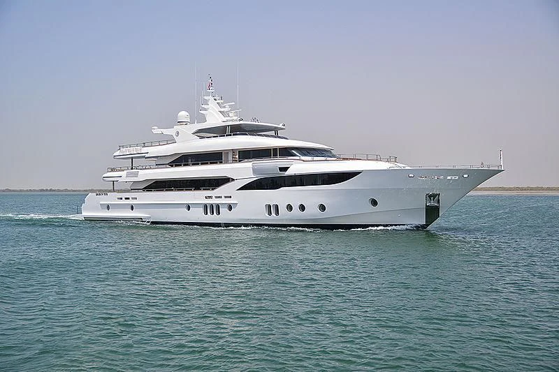 a white yacht in the water aboard MY ESCAPE Yacht for Sale