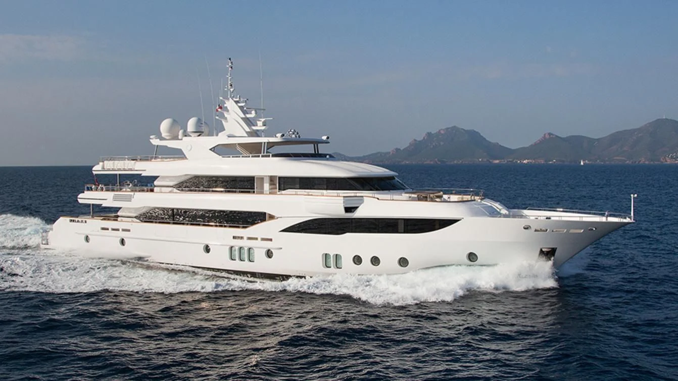 a white yacht in the water aboard MY ESCAPE Yacht for Sale
