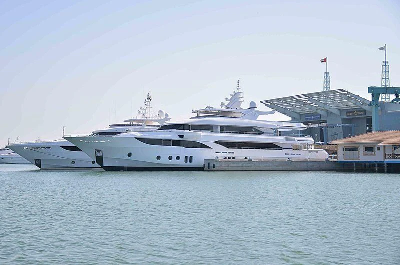 a couple of white boats in the water aboard MY ESCAPE Yacht for Sale