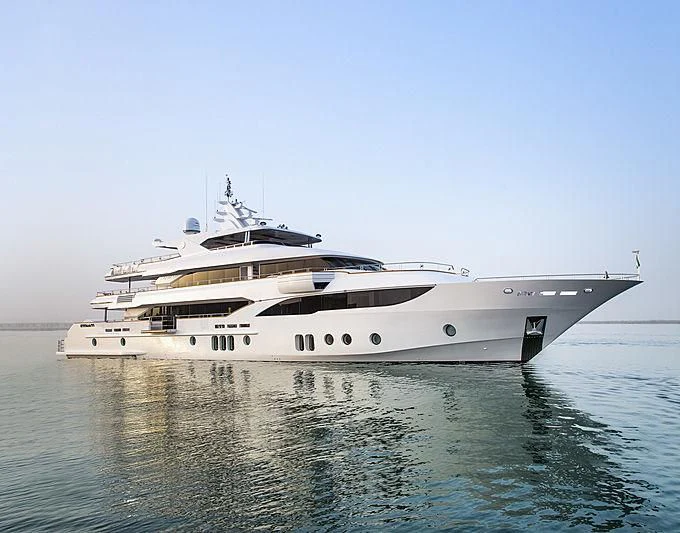 a white yacht on the water aboard MY ESCAPE Yacht for Sale