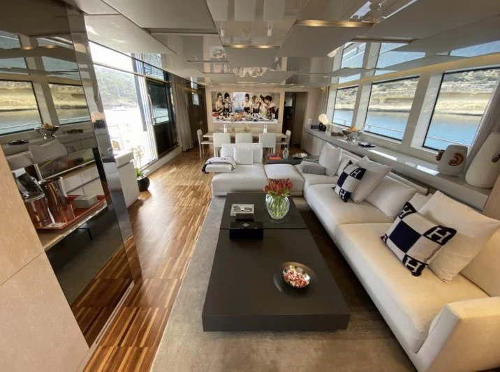 a living room with a large window aboard ENSO 4 Yacht for Sale