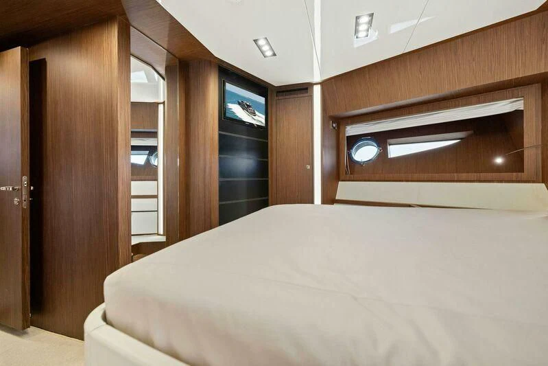 a bed in a room aboard INDISCRETION Yacht for Sale