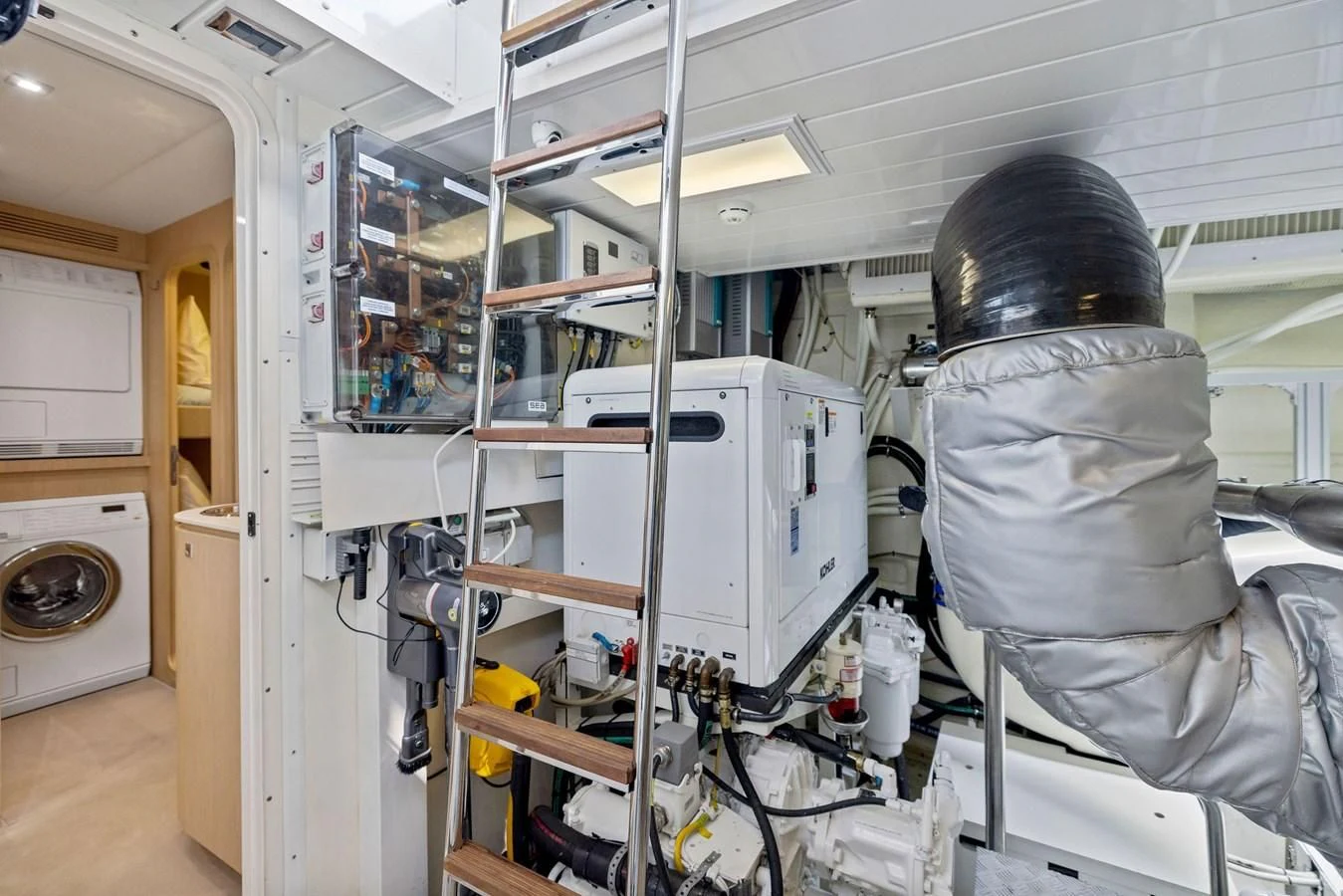 a person in a mask in a room with equipment aboard INDISCRETION Yacht for Sale