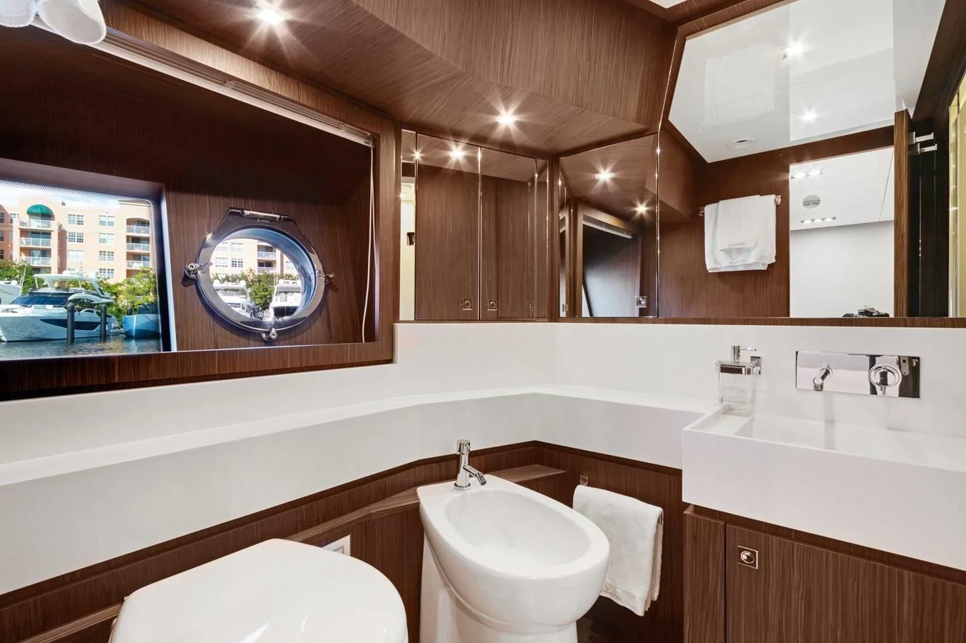 a bathroom with a large mirror aboard INDISCRETION Yacht for Sale