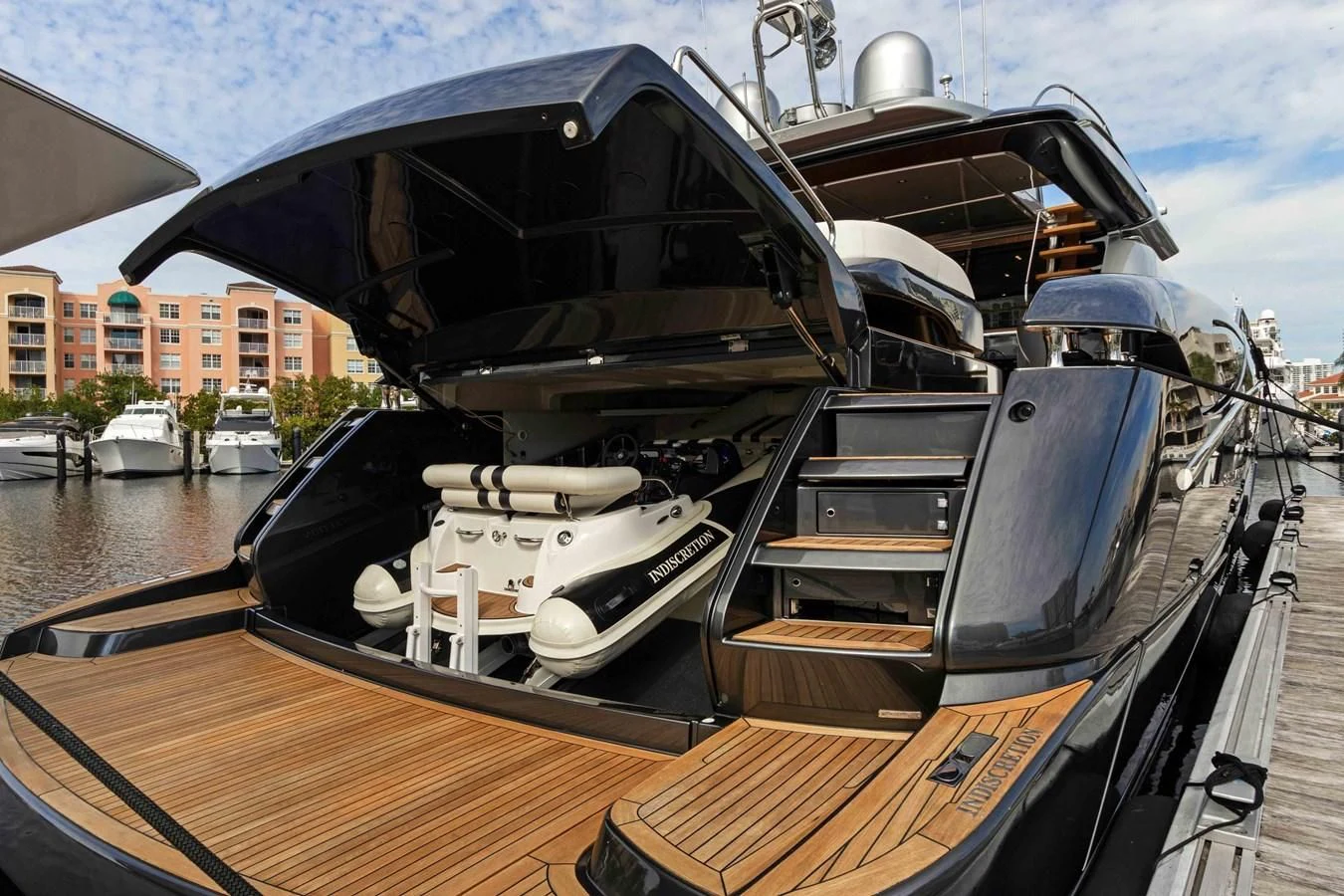 a boat on a dock aboard INDISCRETION Yacht for Sale