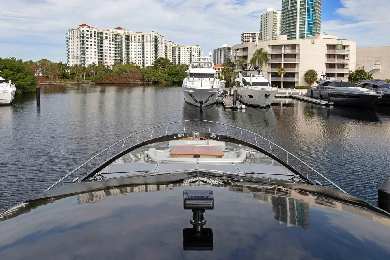 a bridge over a body of water with boats on it aboard INDISCRETION Yacht for Sale
