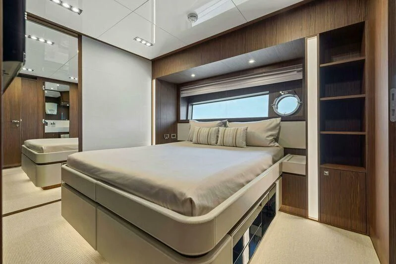 a bed in a room aboard INDISCRETION Yacht for Sale