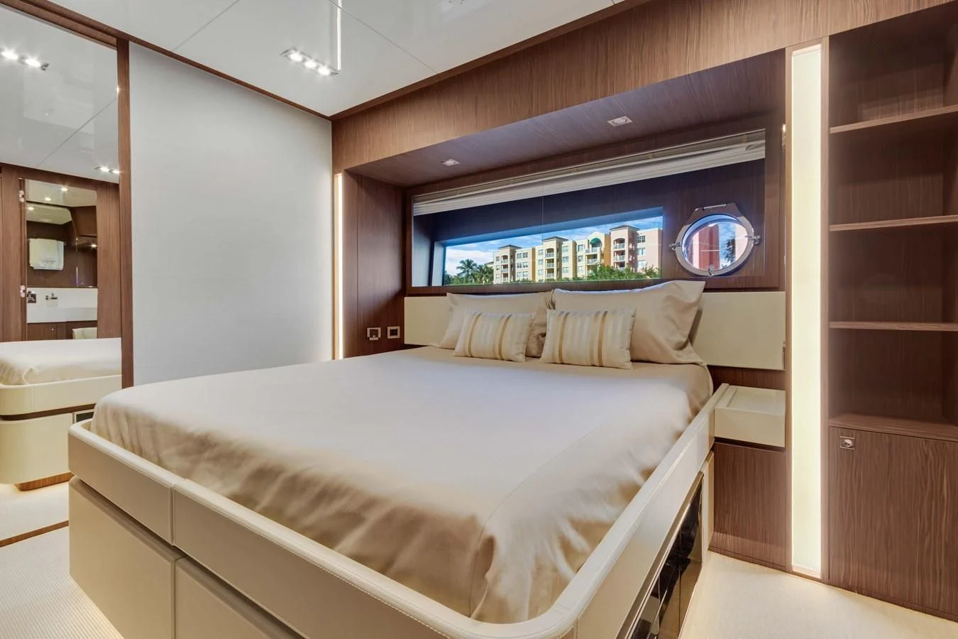 a bed with a white sheet aboard INDISCRETION Yacht for Sale