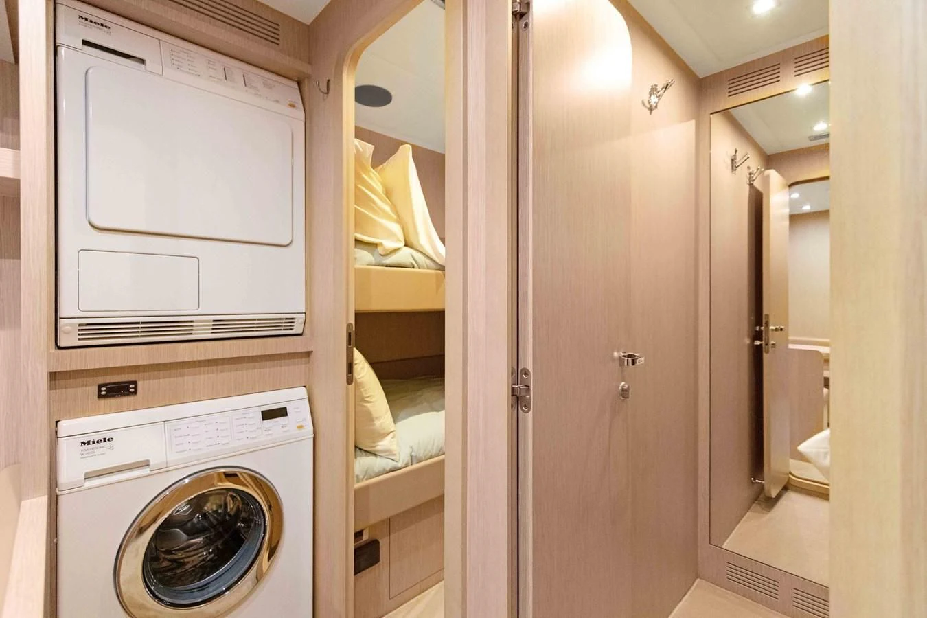 a washer and dryer in a room aboard INDISCRETION Yacht for Sale