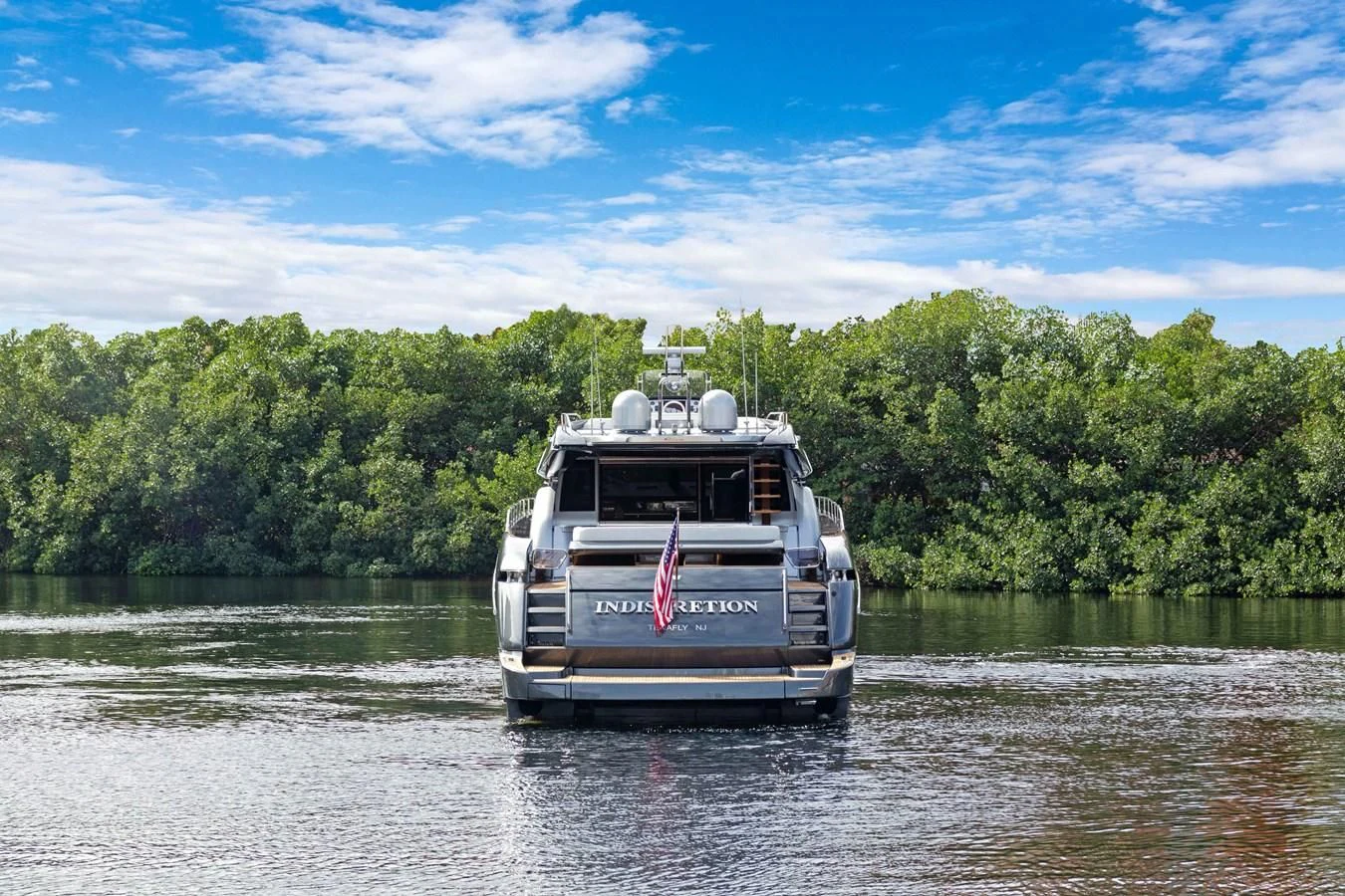 a boat on the water aboard INDISCRETION Yacht for Sale