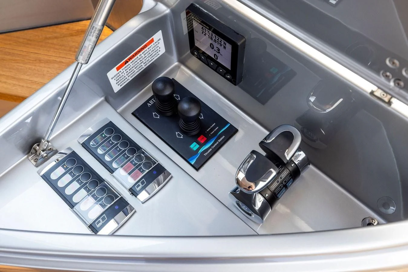 a machine with buttons and a keychain aboard INDISCRETION Yacht for Sale