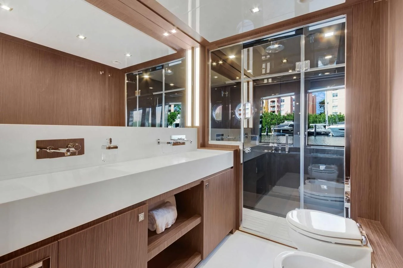 a bathroom with a large mirror aboard INDISCRETION Yacht for Sale