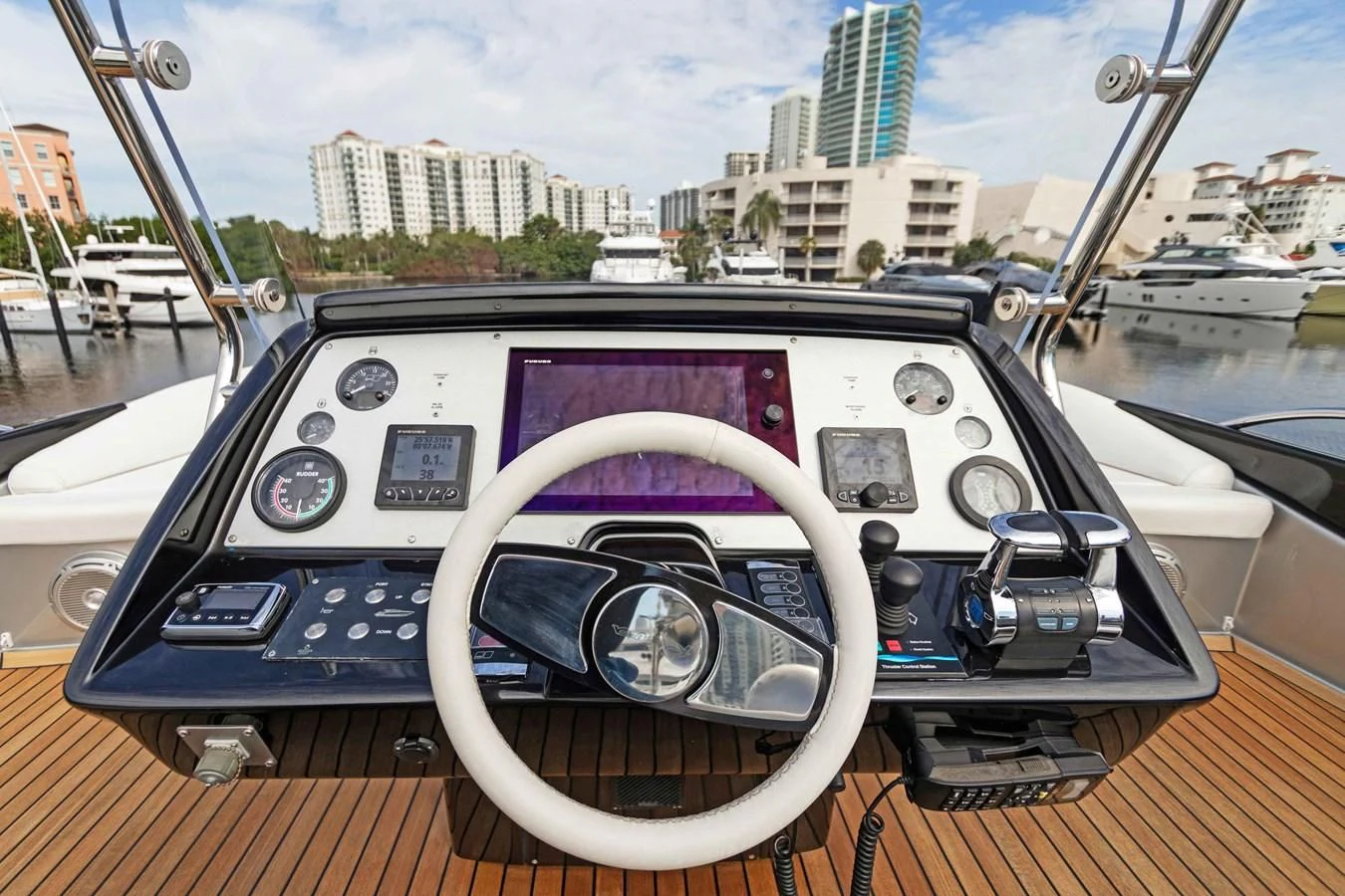 the steering wheel of a boat aboard INDISCRETION Yacht for Sale