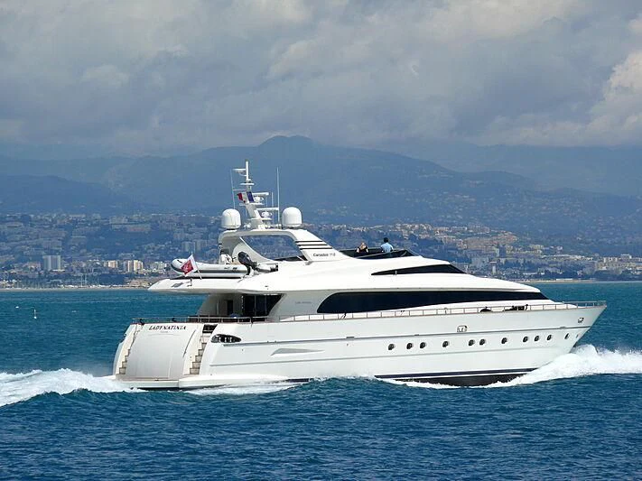 a white yacht on the water aboard L'AYAZULA Yacht for Sale