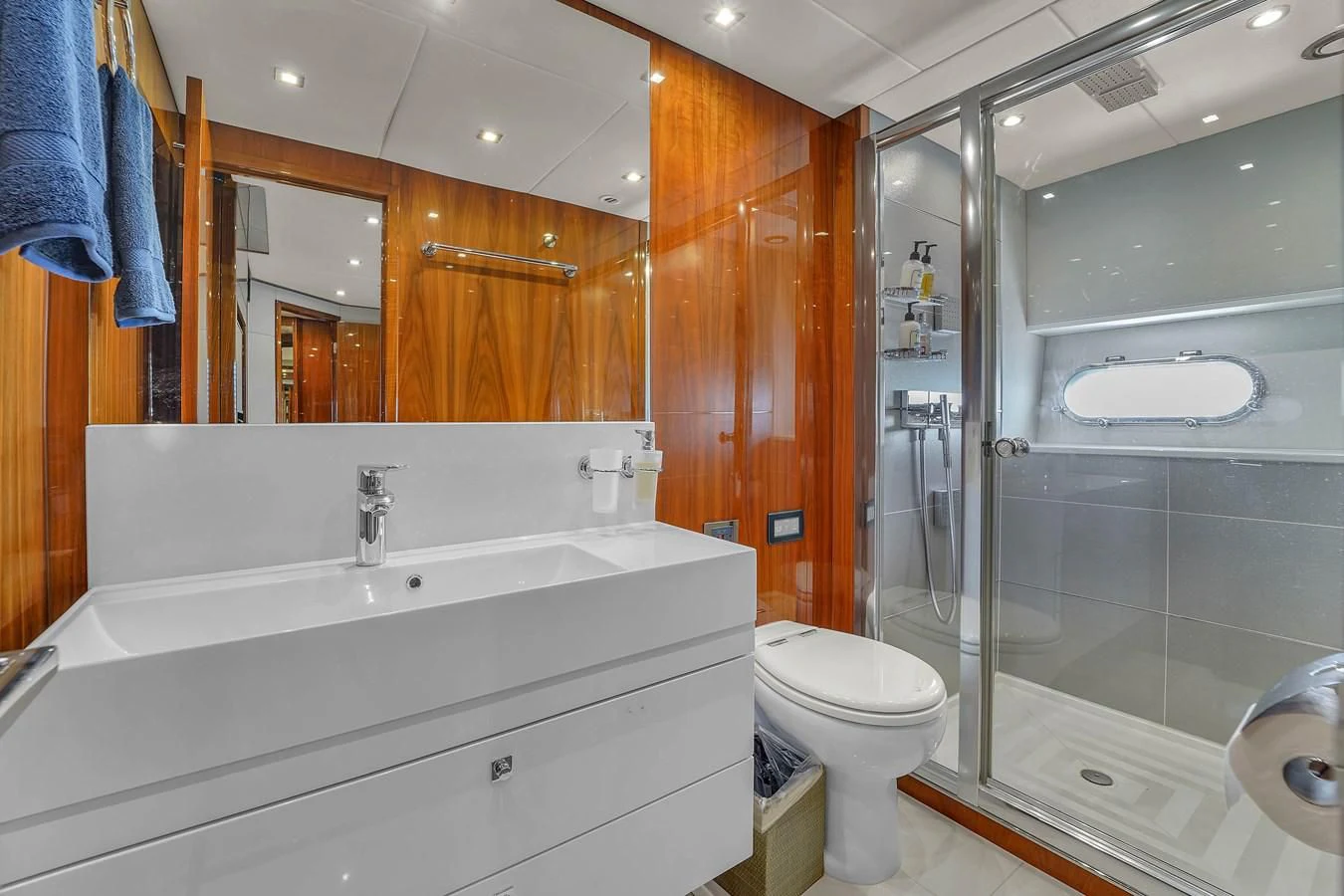 a bathroom with a glass shower aboard 92' SUNSEEKER 2016 Yacht for Sale