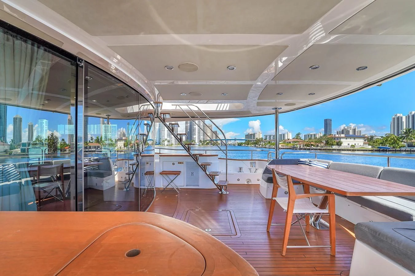a room with a table and chairs aboard 92' SUNSEEKER 2016 Yacht for Sale