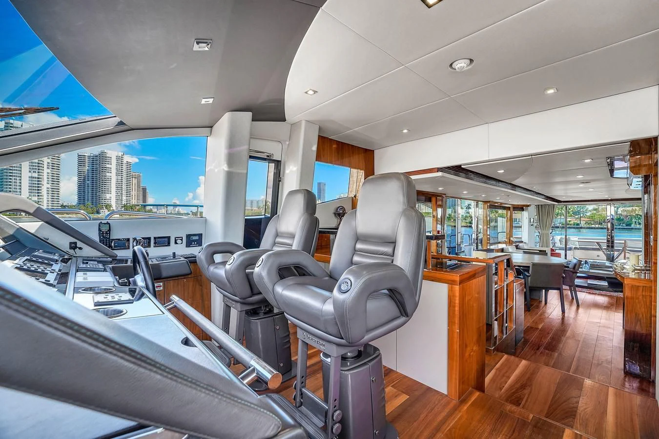 a room with a large window and a view of the city aboard 92' SUNSEEKER 2016 Yacht for Sale