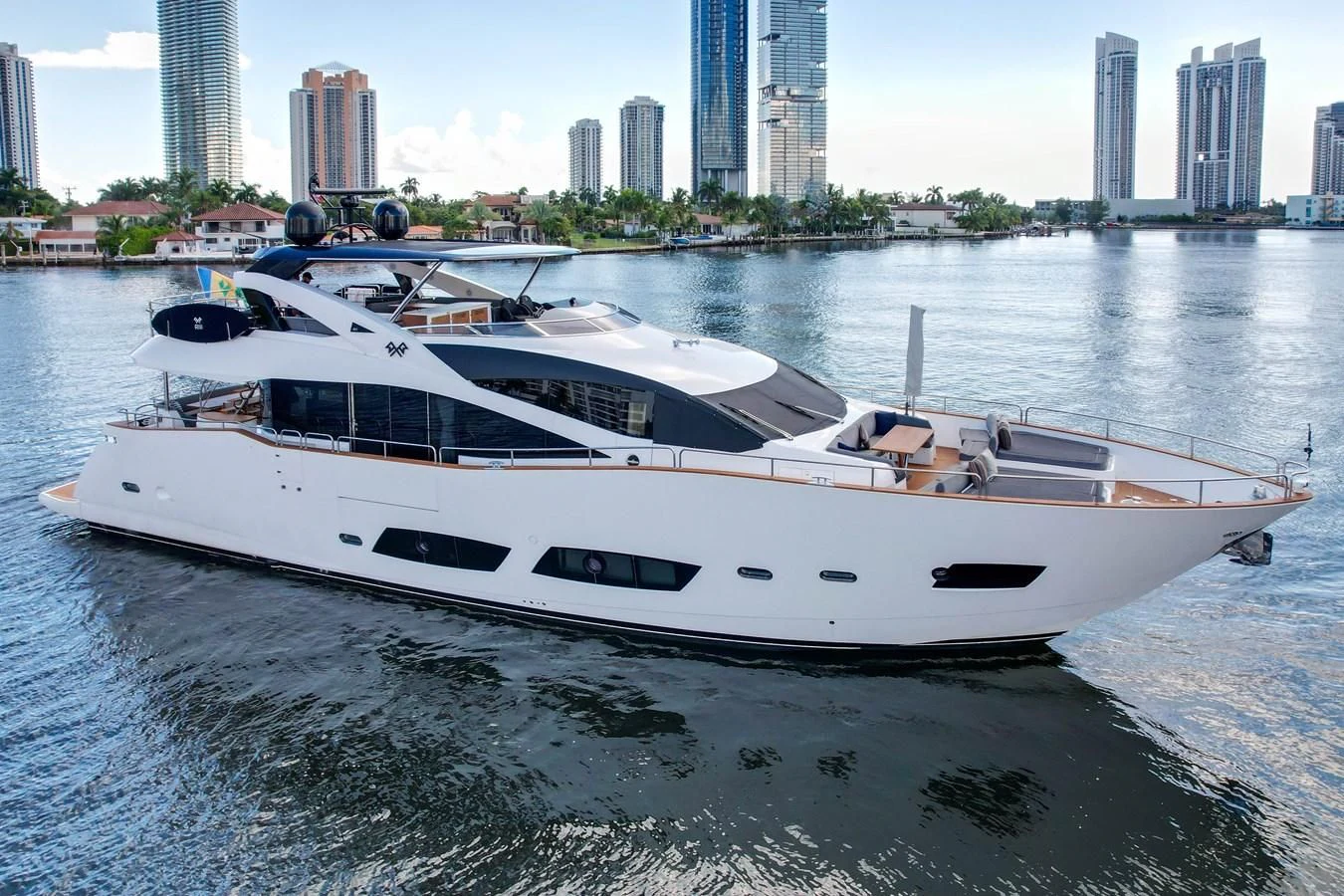 a white yacht on the water aboard 92' SUNSEEKER 2016 Yacht for Sale