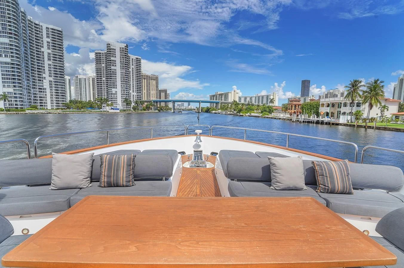 a large pool with a city in the background aboard 92' SUNSEEKER 2016 Yacht for Sale