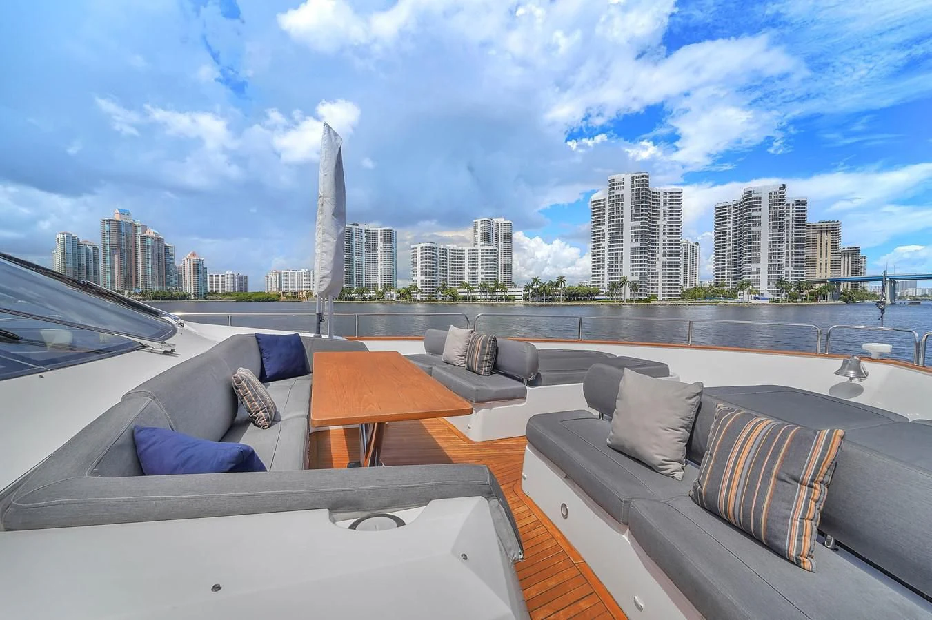 a room with a view of a city and a body of water aboard 92' SUNSEEKER 2016 Yacht for Sale