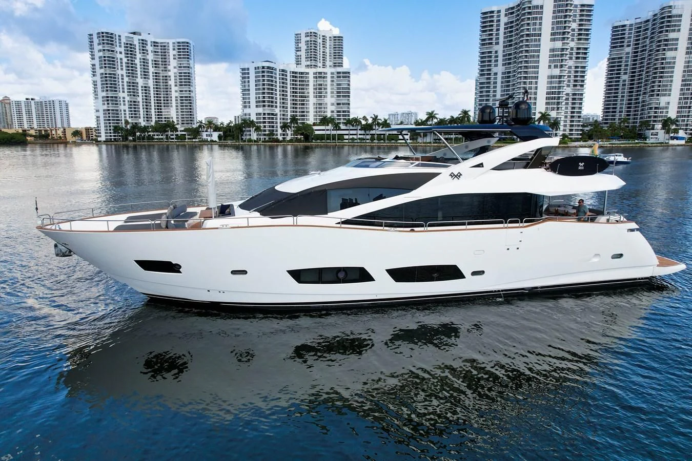 a white yacht in the water aboard 92' SUNSEEKER 2016 Yacht for Sale