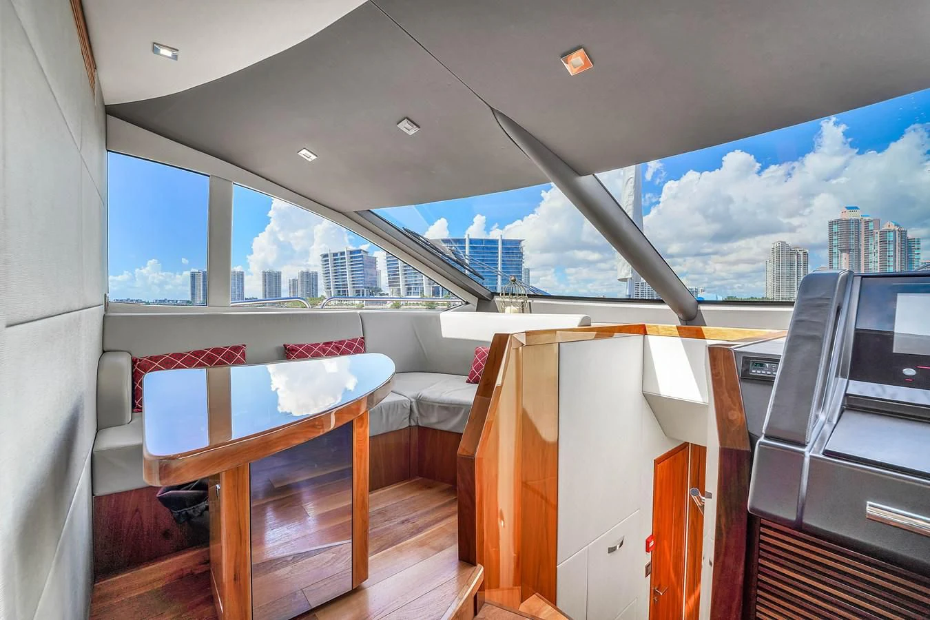 a room with a table and chairs aboard 92' SUNSEEKER 2016 Yacht for Sale