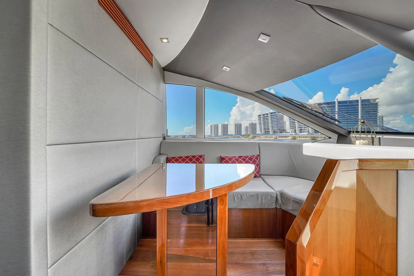 a room with a table and chairs aboard 92' SUNSEEKER 2016 Yacht for Sale
