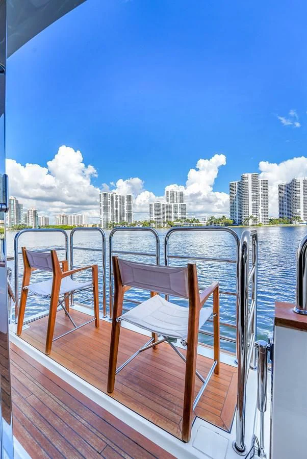 a deck with chairs on it aboard 92' SUNSEEKER 2016 Yacht for Sale