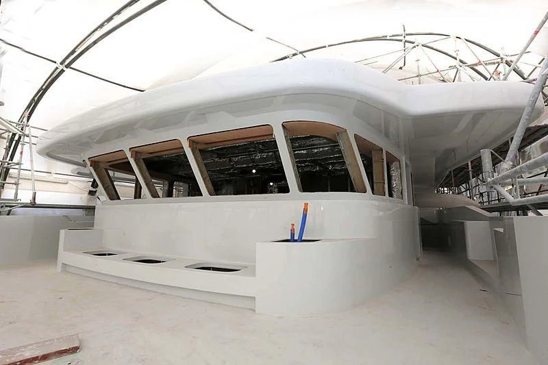 a large white building with a roof aboard METTLE Yacht for Sale