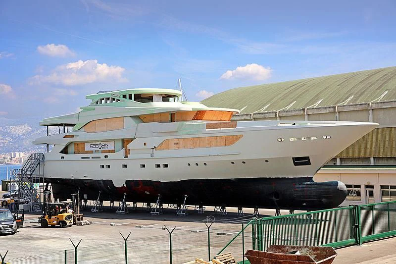 a large cruise ship docked aboard METTLE Yacht for Sale