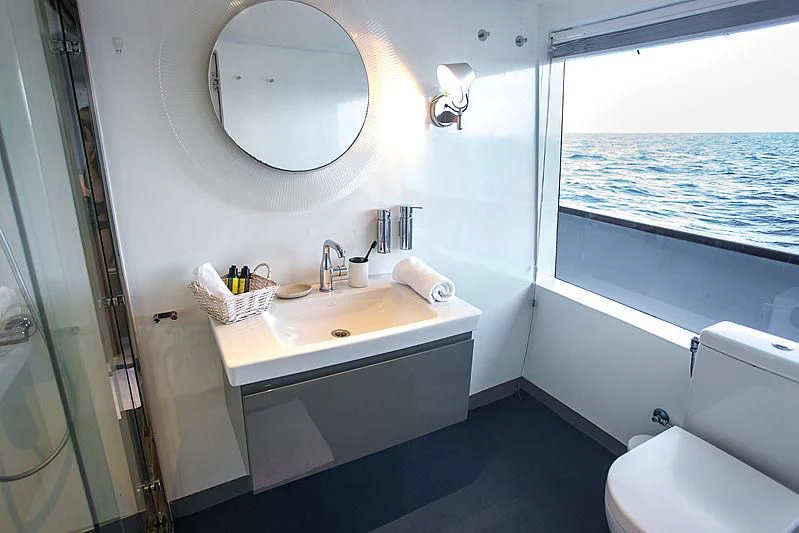 a bathroom with a sink and a toilet aboard AZALEA Yacht for Sale