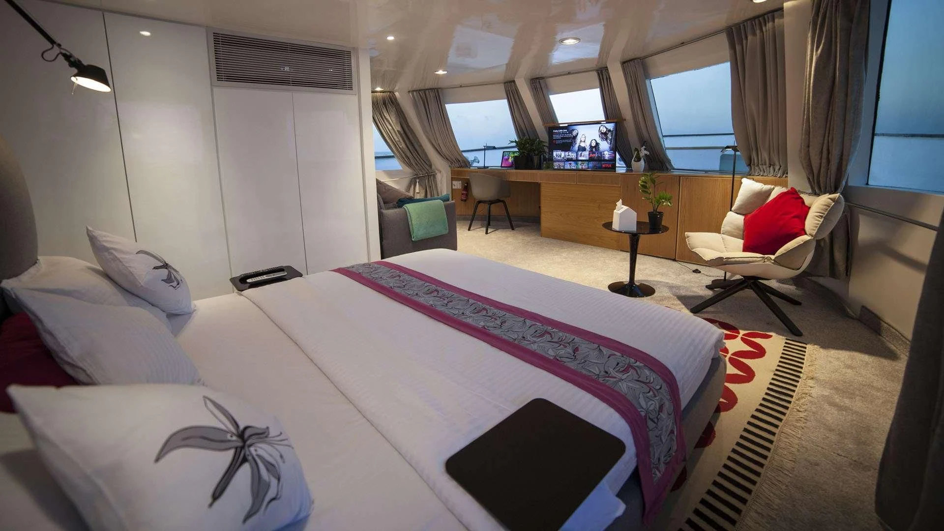 a bed in a room aboard AZALEA Yacht for Sale