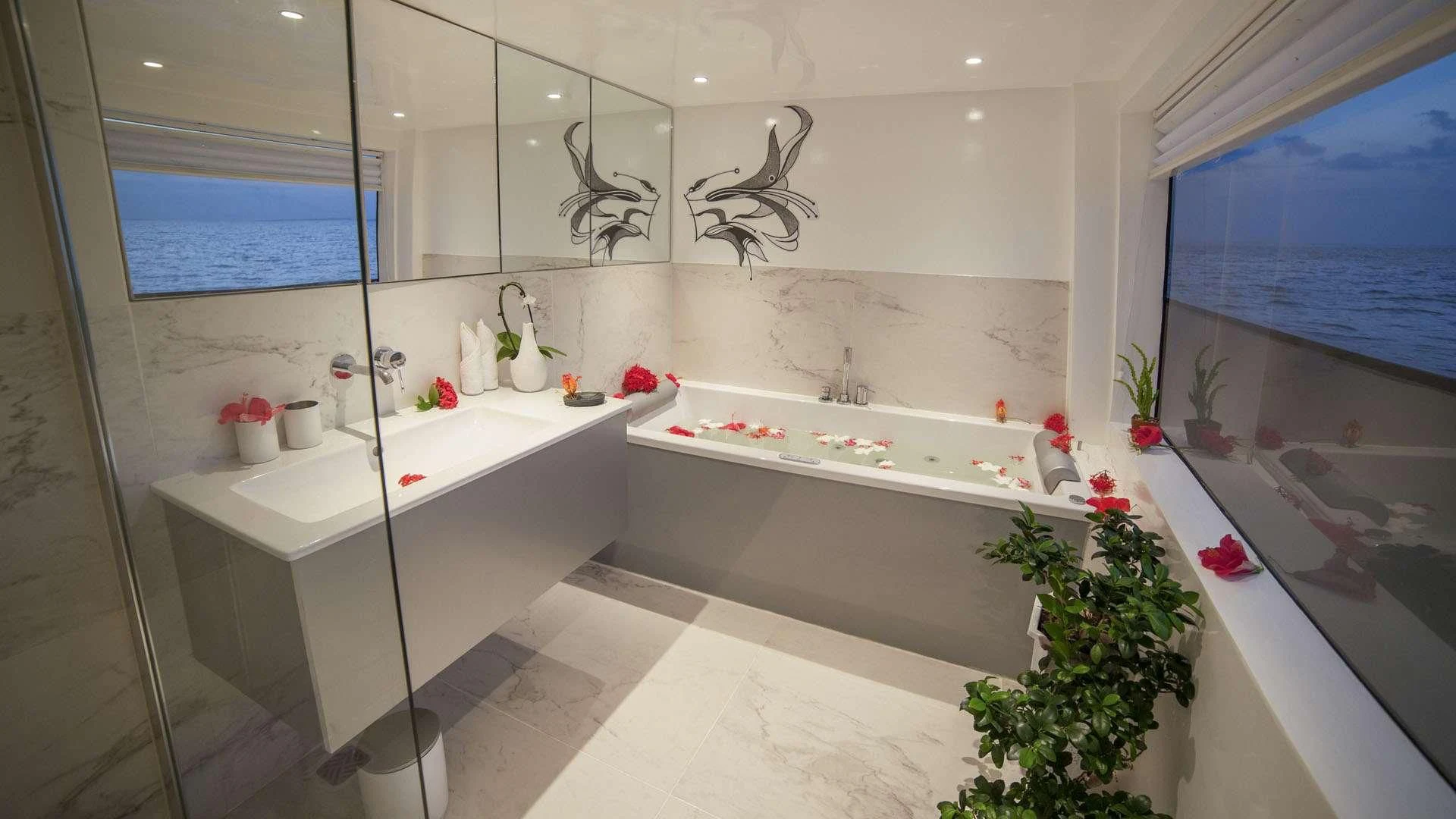 a bathroom with a large tub aboard AZALEA Yacht for Sale