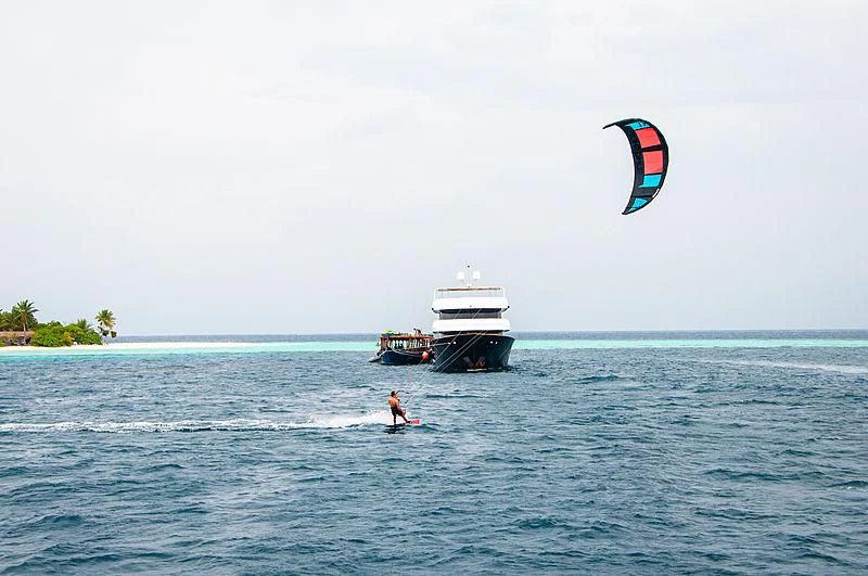a person parasailing on the water aboard AZALEA Yacht for Sale