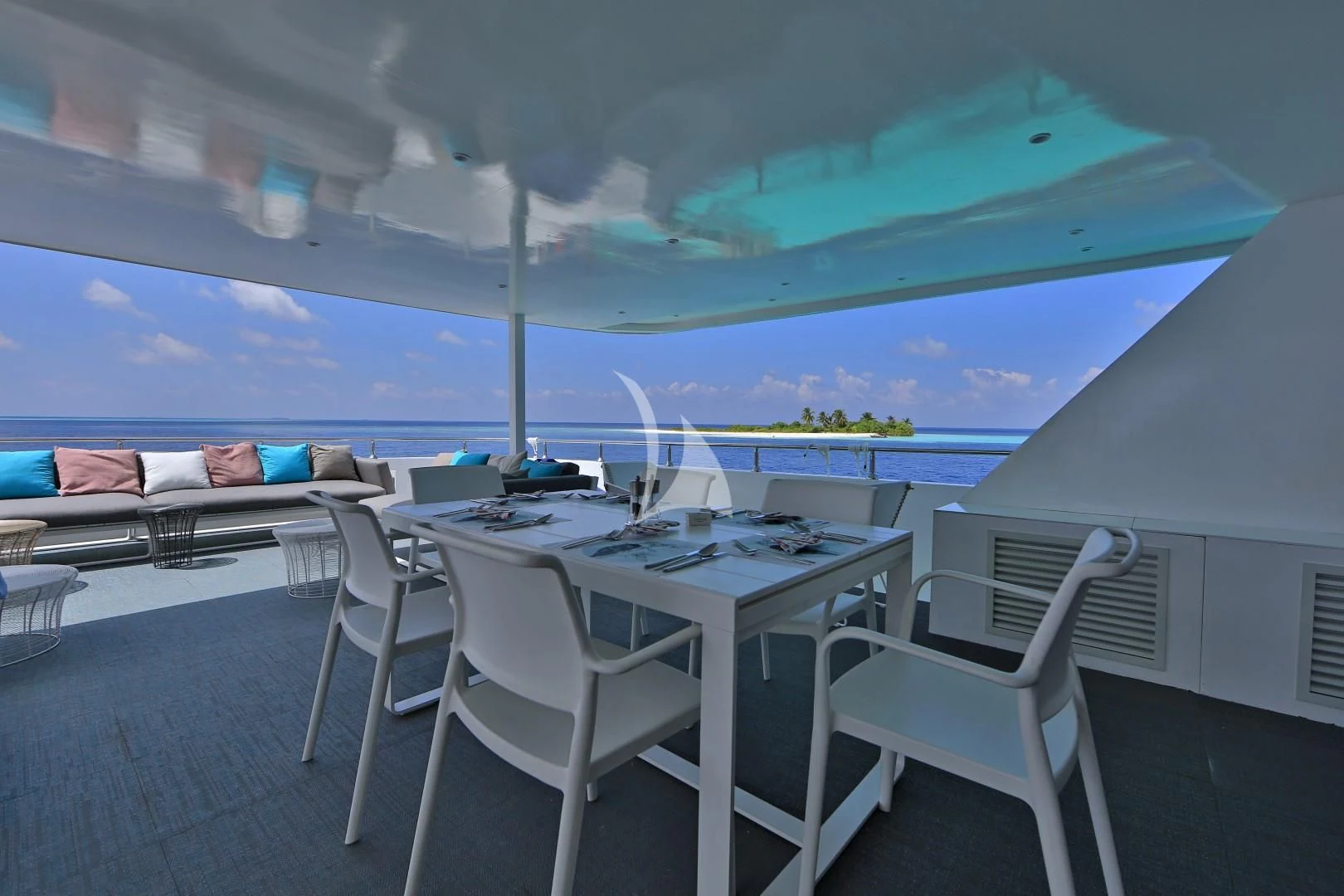 a room with a table and chairs aboard AZALEA Yacht for Sale