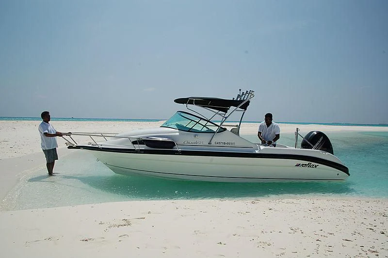 a boat on the beach aboard AZALEA Yacht for Sale