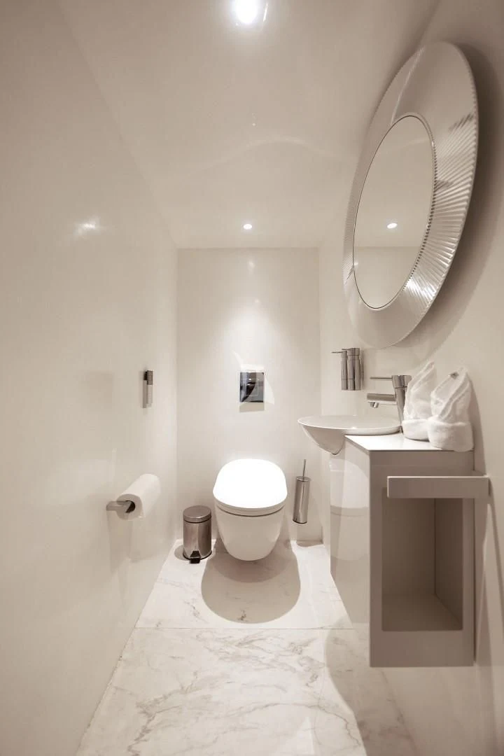 a bathroom with a toilet and a sink aboard AZALEA Yacht for Sale
