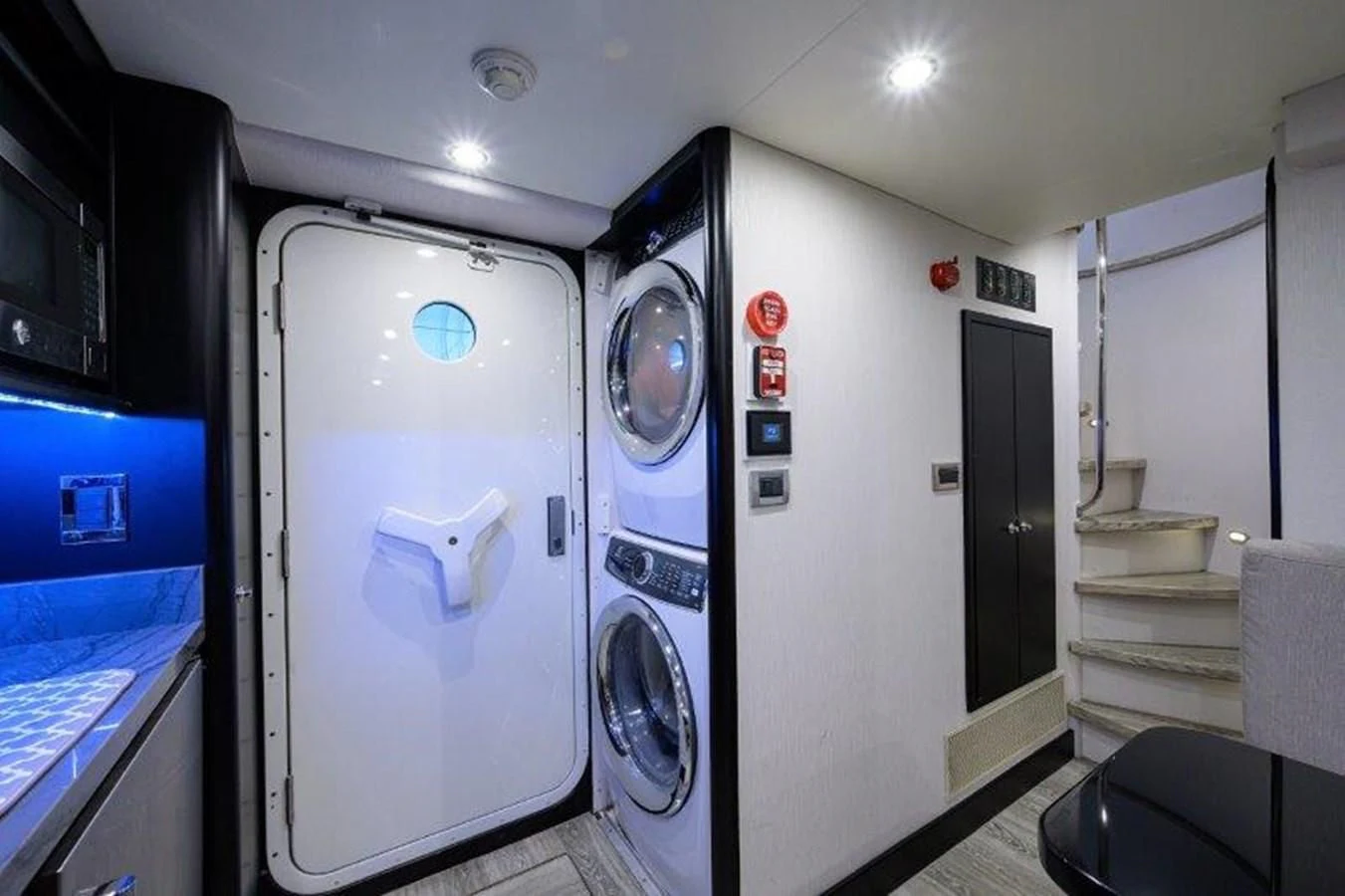 a room with a washer and dryer aboard ODYSSEY Yacht for Sale