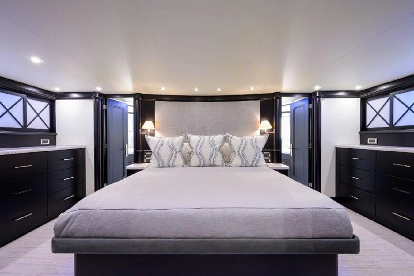 a large bed in a hotel room aboard ODYSSEY Yacht for Sale