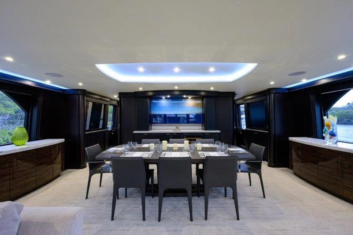 a large room with a table and chairs aboard ODYSSEY Yacht for Sale