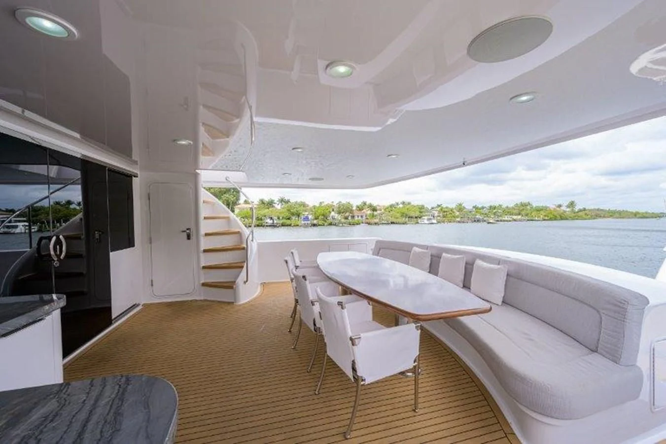 a room with tables and chairs aboard ODYSSEY Yacht for Sale
