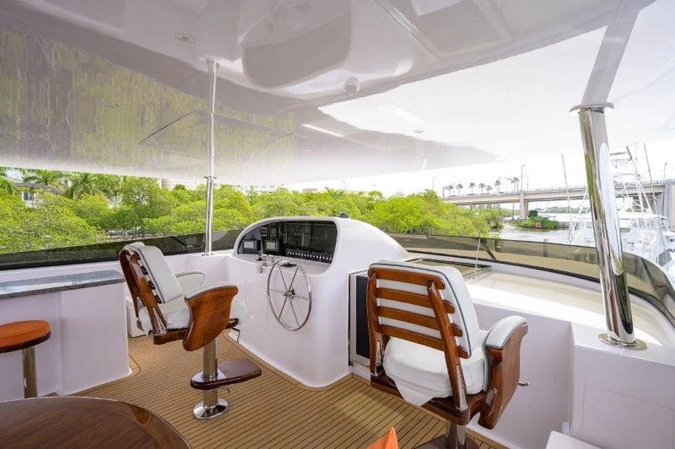 a boat with a table and chairs aboard ODYSSEY Yacht for Sale