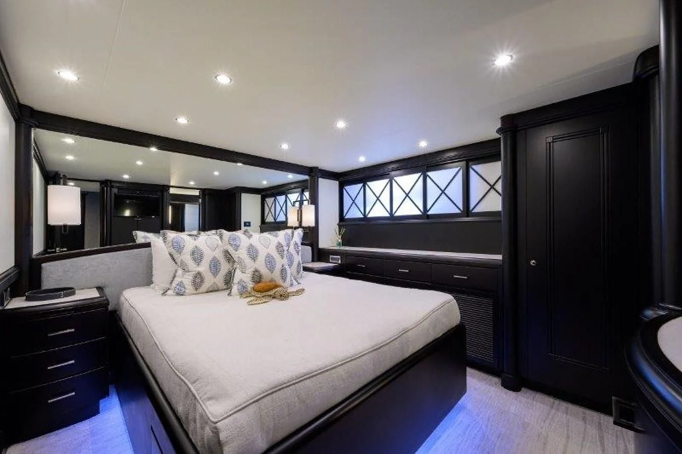 a large bedroom with a large bed aboard ODYSSEY Yacht for Sale