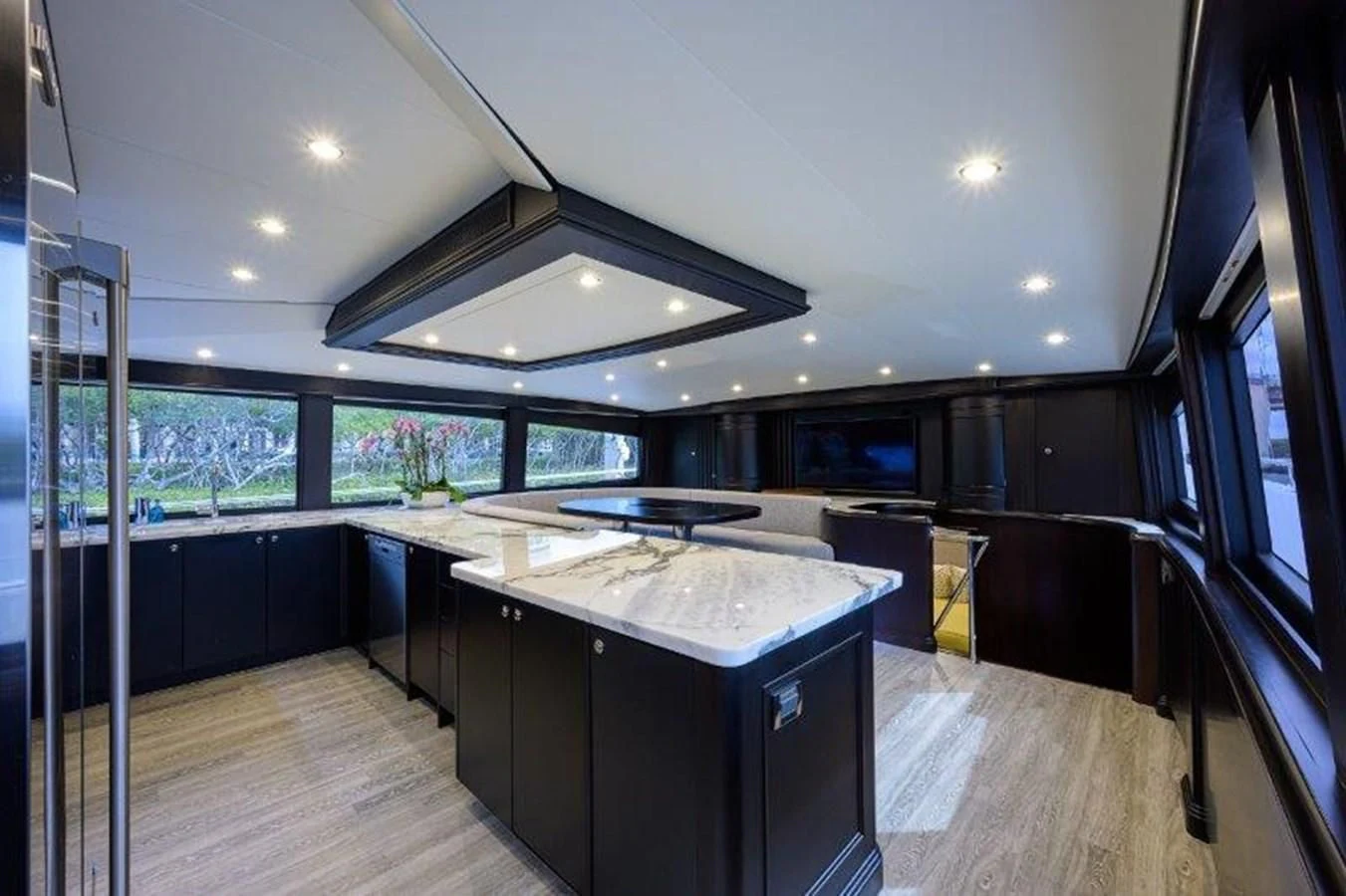 a large kitchen with a large island aboard ODYSSEY Yacht for Sale
