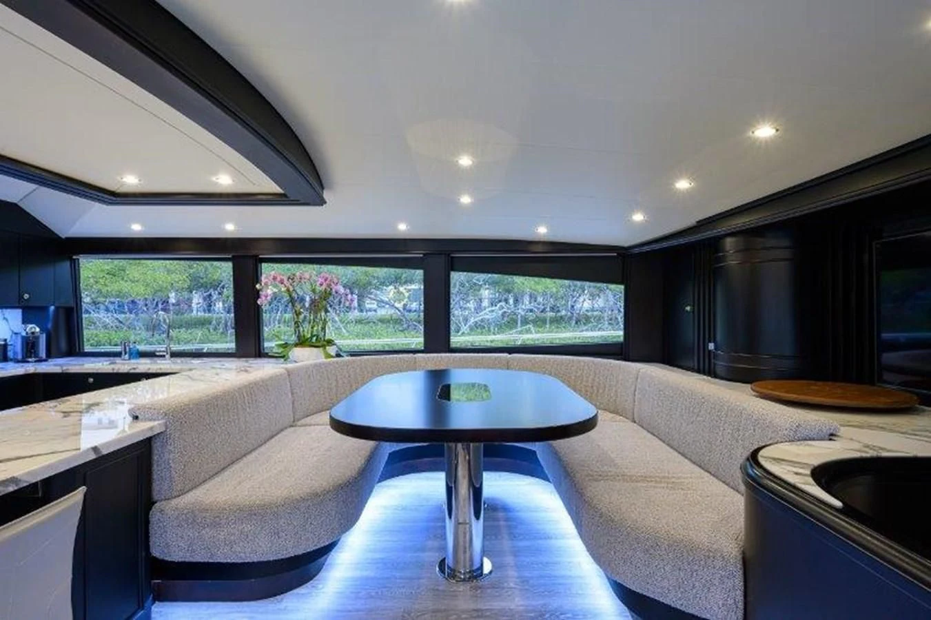 a modern looking living room aboard ODYSSEY Yacht for Sale