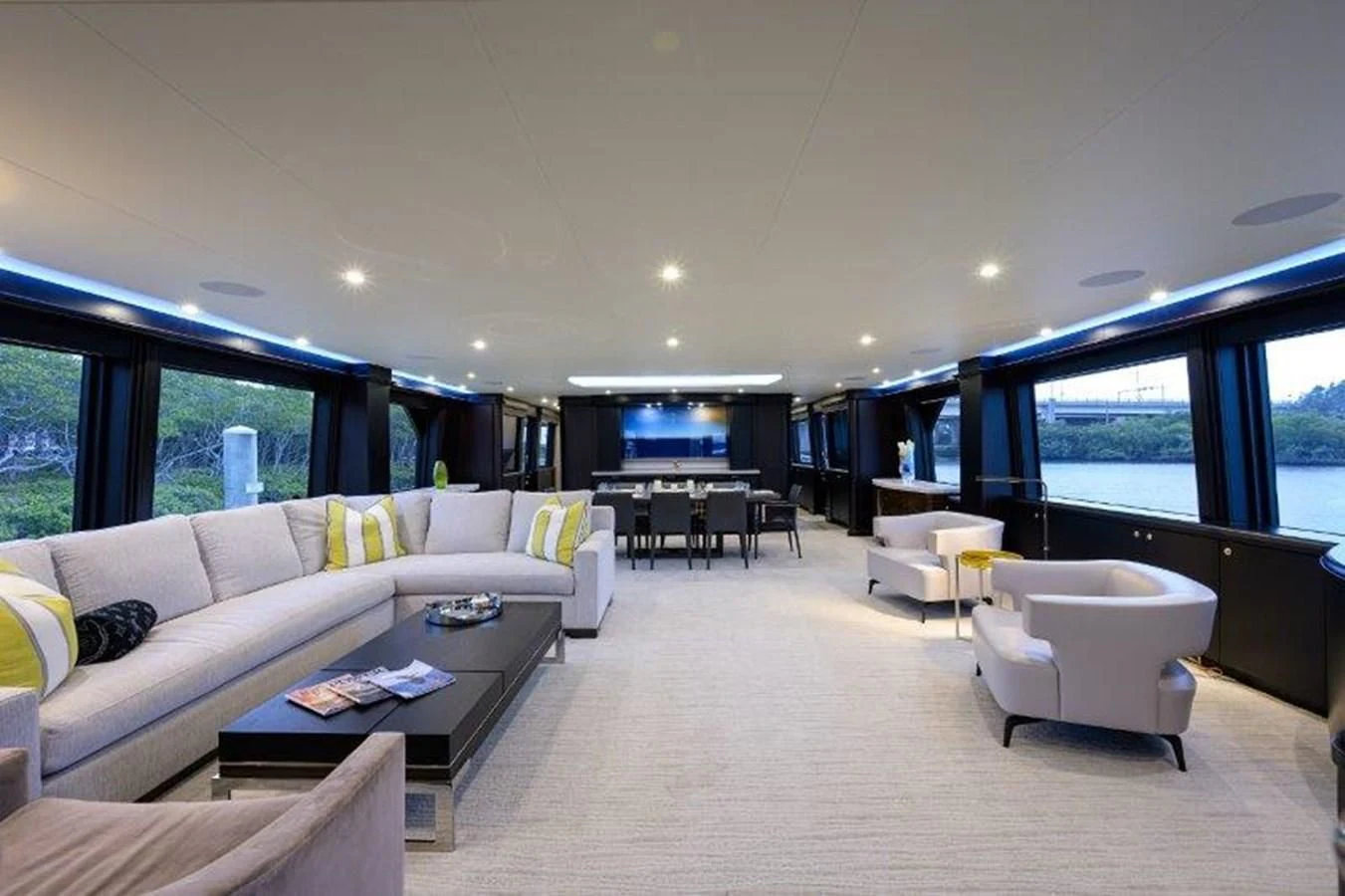 a living room with a large window aboard ODYSSEY Yacht for Sale