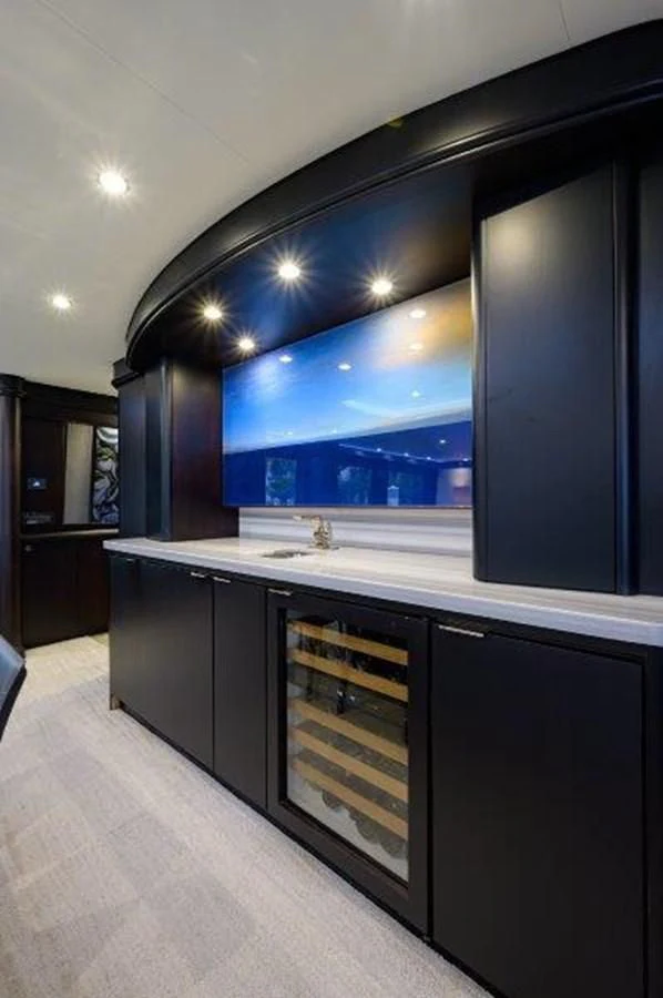 a kitchen with a large window aboard ODYSSEY Yacht for Sale